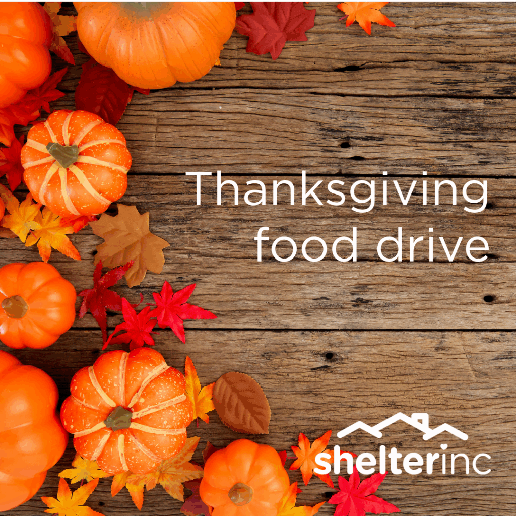 pumpkins and autumn leaves with text "Thanksgiving food drive"